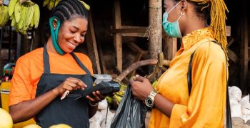 front-view-woman-with-face-mask-market_23-2148777463